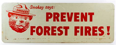 Lot 384: Smokey the Bear "Prevent Forest Fires" Sign; Decal on aluminum with picture of Smokey ...