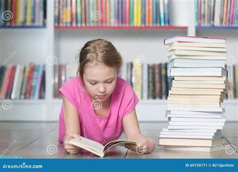 Cute Girl Reading Book in Library Stock Image - Image of literature ...