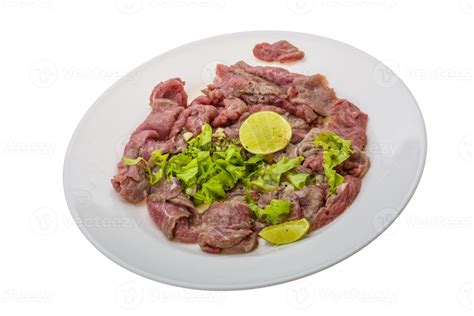 Beef carpaccio meal 10861898 Stock Photo at Vecteezy