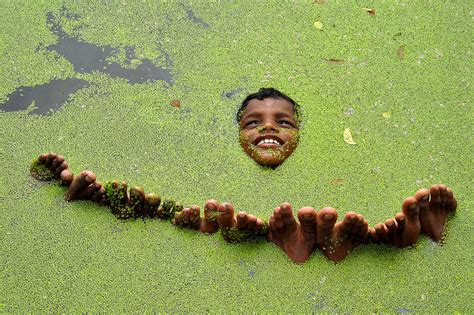 village boys relaxing, india photo | One Big Photo