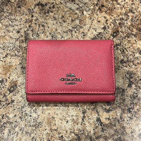 Pink Coach wallet !! Size: on the smaller size,... - Depop