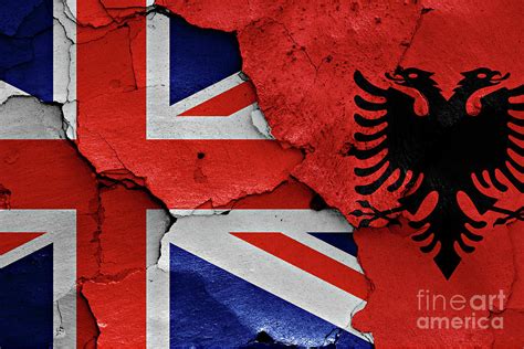 flag of UK and Albania painted on cracked wall Photograph by Dan Radi ...