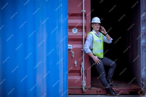 Premium Photo | Portrait team dock workers posing under working and ...