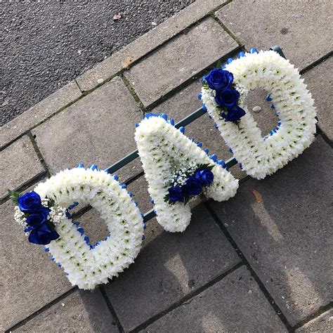 Blue and white dad funeral flowers tribute wreath | Dad funeral flowers, Funeral flowers ...