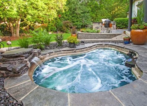 In Ground Hot Tub Cost Uk With Waterfall | Home Ideas | Hot tub, Inground hot tub, Patio design