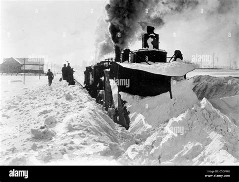 Snow plow in field in Michigan, USA Stock Photo - Alamy