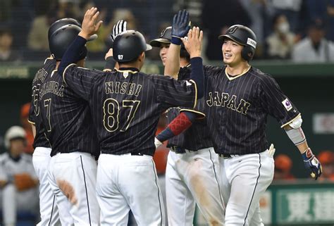 Suzuki sends Japan to victory with 10th-inning grand slam - The Japan Times