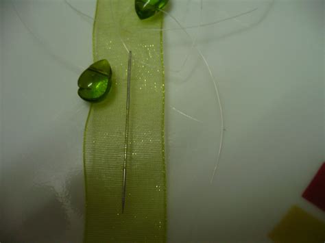 When the needle comes out at the end of this running stitch thread another bead, make another ...