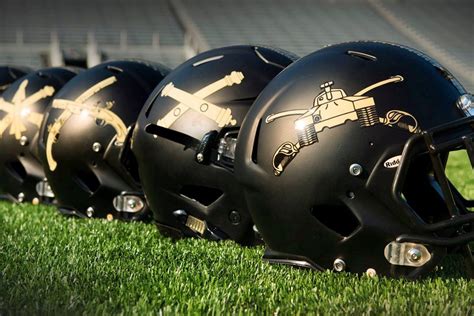 Army wearing a bunch of special helmets, too | Football helmets, Army ...