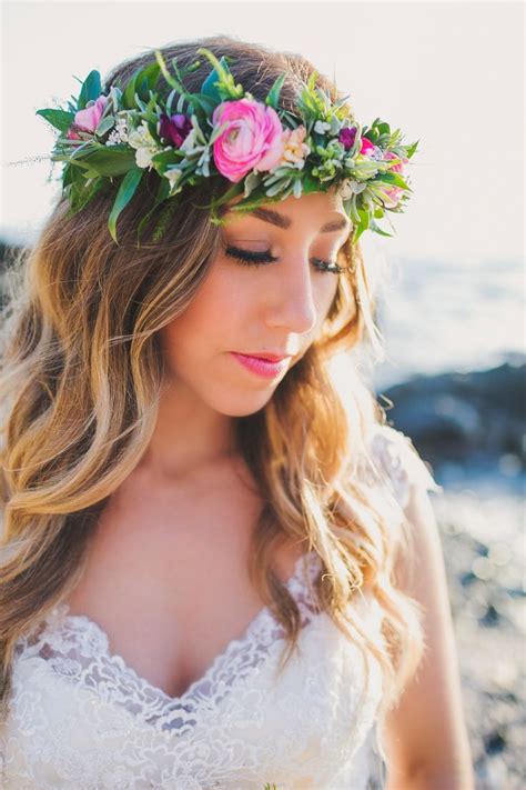 A boho inspired bride wearing her beautiful Haku Lei Flower Crown in this Maui Hawaii ...