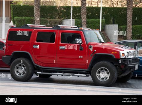 Bright Red Hummer H2 Luxury Sports Utility Vehicle Stock Photo - Alamy