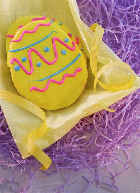 Decorated chocolate Easter egg - Stock Photo - Dissolve