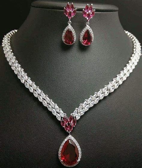 A beautiful diamond and Ruby necklace and matching earrings. | Diamond jewelry necklace, Ruby ...