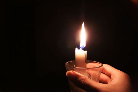 Lit candle during a blackout | Lit candles photography, Candles photography, Candles