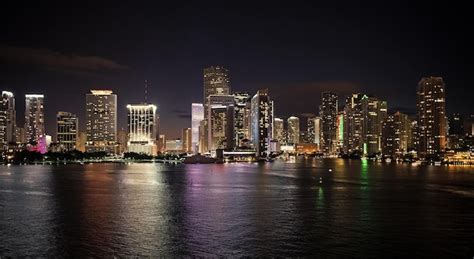 Premium Photo | Miami skyscrapers skyline at night Aerial view