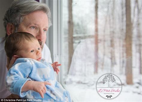 Connecticut home invasion survivor William Petit poses for pictures with his new son as he ...