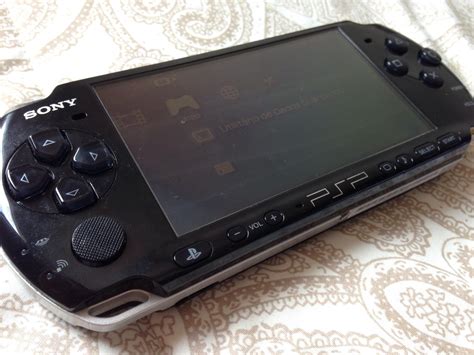 Psp Slim 3000 8 Gigas Destravado 100 Jogos Na Caixa - R$ 400,00 em Mercado Livre