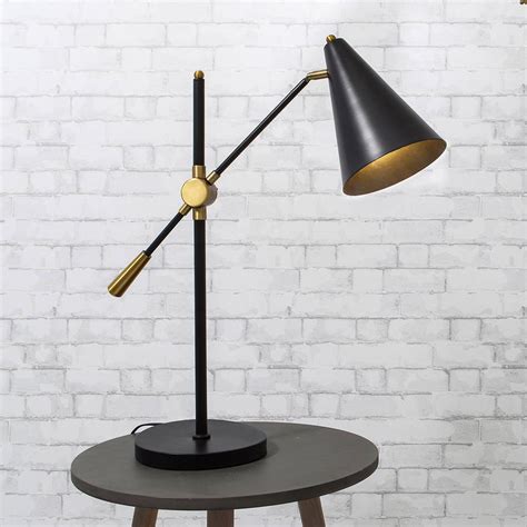 gold and black deco desk lamp by the forest & co | notonthehighstreet.com