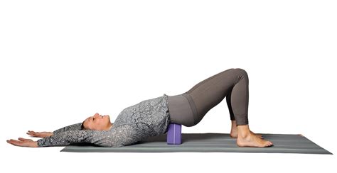 Shore Up Your Bridge Pose with a Yoga Block - Hugger Mugger