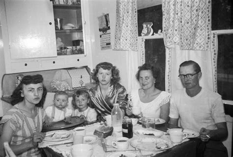 Family gathered around the breakfast table | Undated. Scanne… | Flickr