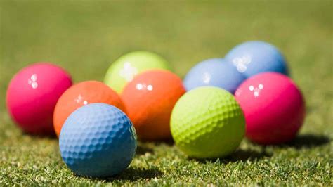 Does using a different color ball on each hole violate the one-ball rule?