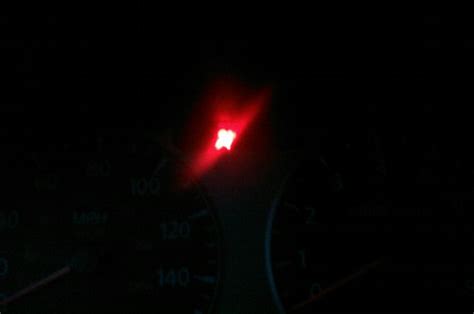 weird flashing red light above speedometer?