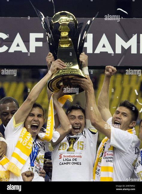 Club America players raise the championship trophy after defeating the Montreal Impact 4-2 in ...