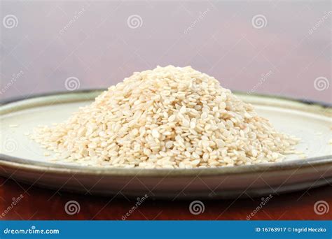 White sesame seeds stock image. Image of ingredient, close - 16763917