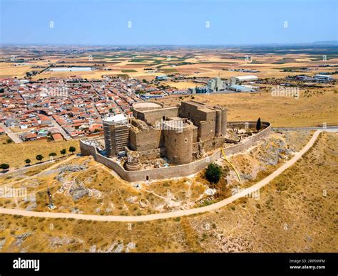 An aerial view of iconic Consuegra Castle (Spanish: Castillo de Consuegra), La Mancha, Spain ...