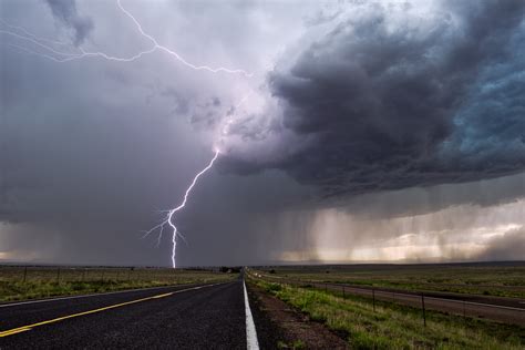 Wild Photos Show Aftermath of Lightning Strike That Made Road Explode - Newsweek