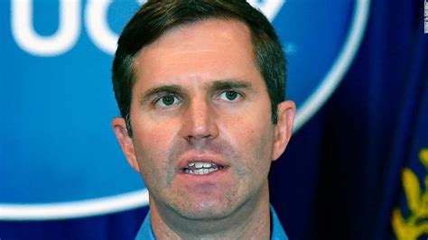 Kentucky Gov. Andy Beshear is quarantining with his family after a member of his security detail ...