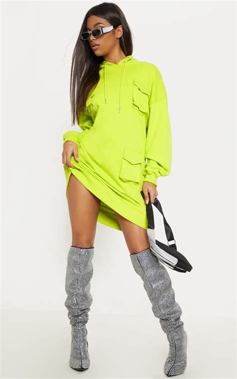 Neon Green Pocket Hoodie Dress | Dresses | PrettyLittleThing