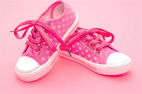 Little Girls Pink Baby Shoes Stock Photo - Image of pink, macro: 24736296