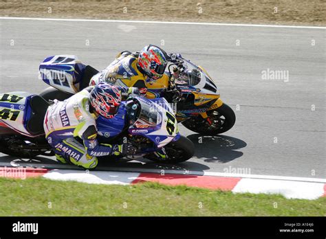 World Superbike riders Noriyuki Haga and Troy Croser battle it at out at the 2005 British round ...