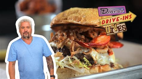 Guy Fieri Eats a Surf 'n' Turf Burger | Diners, Drive-Ins and Dives | Food Network - YouTube