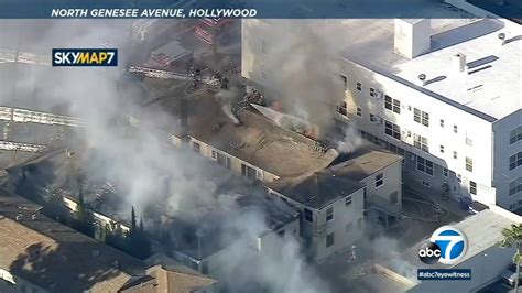 Woman rescued as firefighters battled large apartment fire in Hollywood - ABC7 Los Angeles