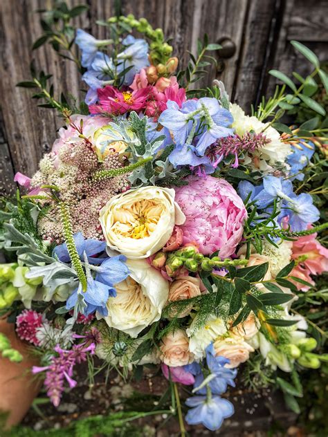 Peonies and country garden flowers create a beautiful natural bouquet Who does not l… | Country ...