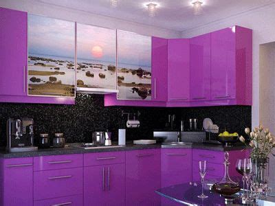 a kitchen with purple cabinets and glass table