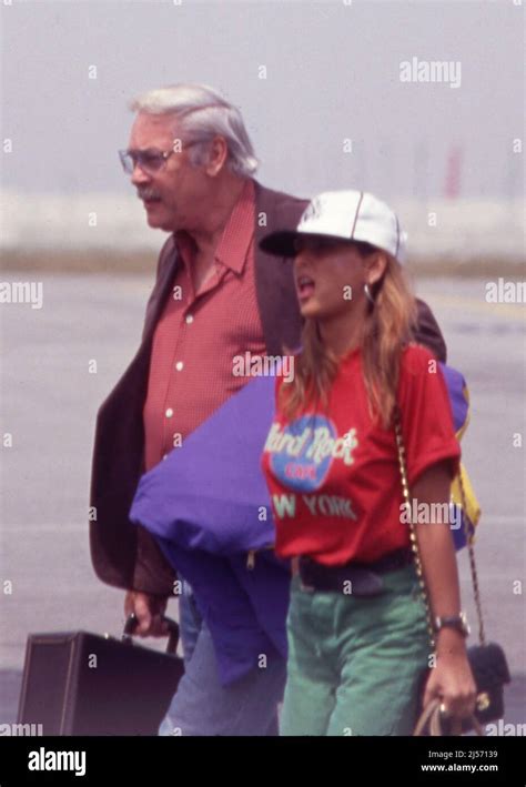 Jerry Buss and Jeanie Buss seen arriving at LAX Airport April 1992 ...