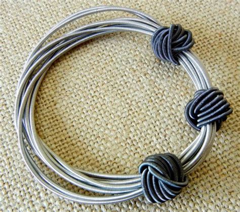 Piano Wire Bracelet Silver With Slate Knots | Etsy | Wire bracelet ...