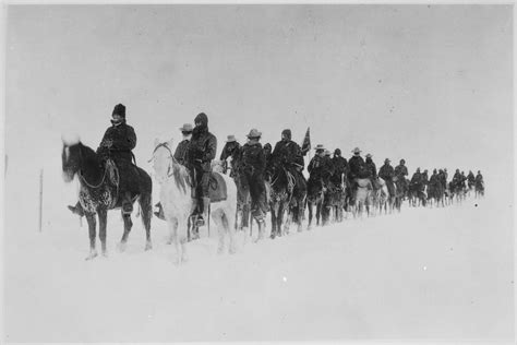 A photograph of the Seventh Cavalry at Pine Ridge returning from the fighting at Wounded Knee ...