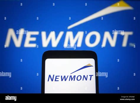 In this photo illustration, the Newmont Corporation logo of a gold ...