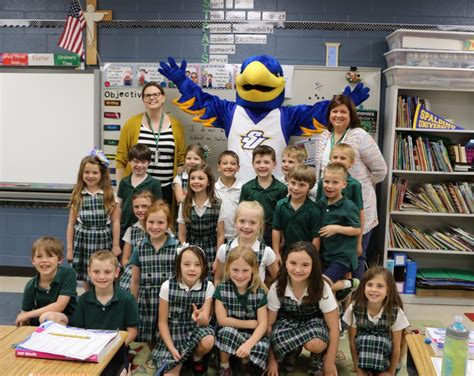 Spalding mascot Ollie the Eagle swoops in to meet St. Patrick Catholic School first-graders ...