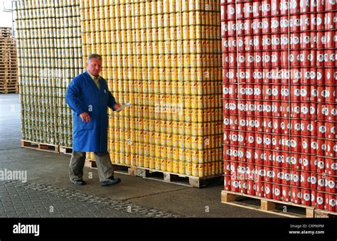 Pallets of beer cans in brewery, Frankfurt / Oder Stock Photo - Alamy