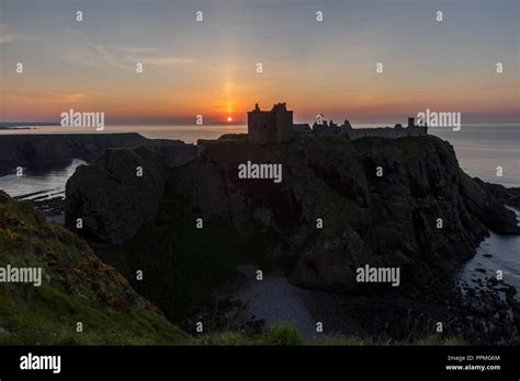 Sunrise at Dunnottar Castle Stock Photo - Alamy