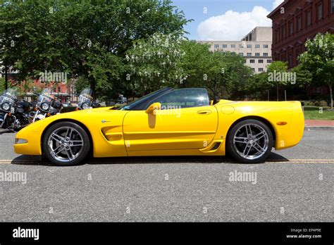 2003 Yellow Chevy Corvette convertible profile view - USA Stock Photo ...