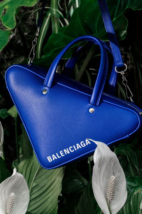 Gorgeous blue Balenciaga purse shaped like a triangle. #designer # ...