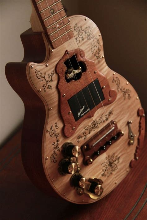 Left-handed steampunk electric ukulele. More images on site. | Guitarra bajo, Guitarras ...