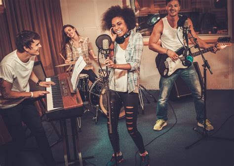 Music Band Performing in a Studio Stock Image - Image of playing ...