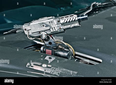 Machine gun on Aston Martin DB5, James Bond classic car Stock Photo ...